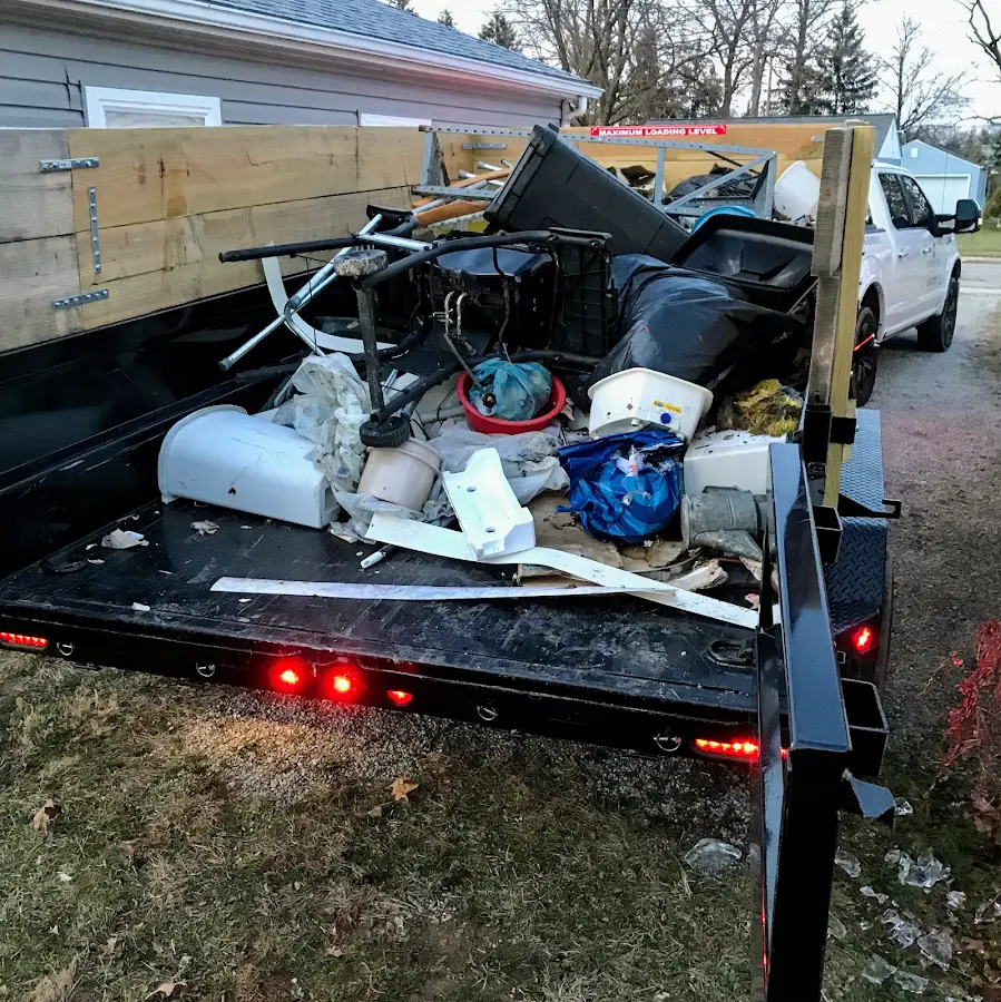 Roll-off dumpster delivered to a residential driveway in Hounsfield